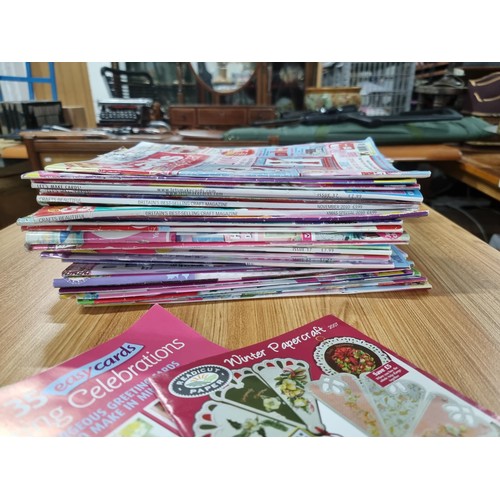 275 - 2 large stacks of card and paper craft making magazines dating from the 2000's along with 8 novels a... 