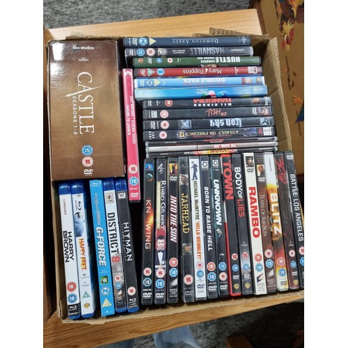 276 - 2 boxes full of various DVD's to include 5 blu rays, a castle boxset, life on mars box set, etc. Ple... 