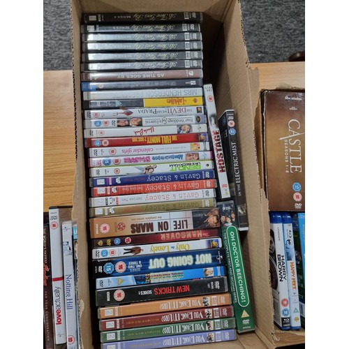 276 - 2 boxes full of various DVD's to include 5 blu rays, a castle boxset, life on mars box set, etc. Ple... 