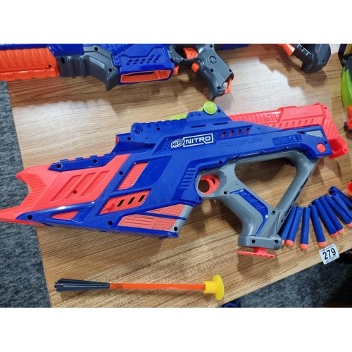 279 - A large collection of Nerf guns and accessories to include a Nerf car shooter, Nerf elite N-strike, ... 