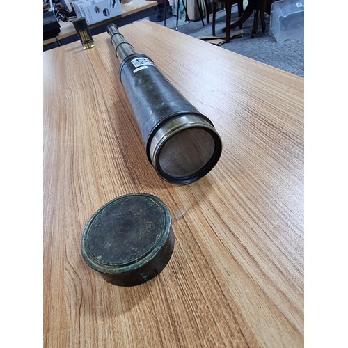 284 - An antique four drawer telescope with a cased replacement eye piece, length of telescope fully exten... 