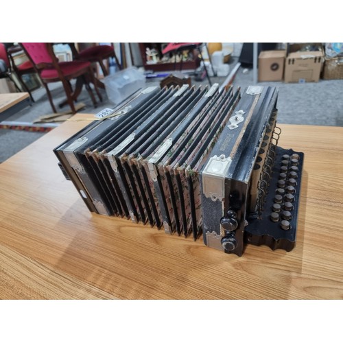 285 - An antique German made accordion by Pro matic Accordeon in excellent condition, bellows appear to be... 