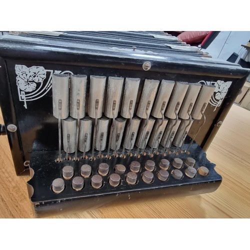 285 - An antique German made accordion by Pro matic Accordeon in excellent condition, bellows appear to be... 