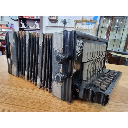 285 - An antique German made accordion by Pro matic Accordeon in excellent condition, bellows appear to be... 