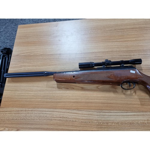 287 - A vintage good quality BSA .22 air rifle with a silencer fitted along with Nikko stirling silver cro... 