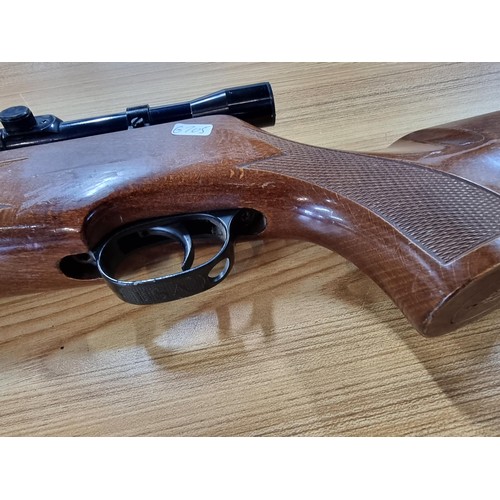 287 - A vintage good quality BSA .22 air rifle with a silencer fitted along with Nikko stirling silver cro... 