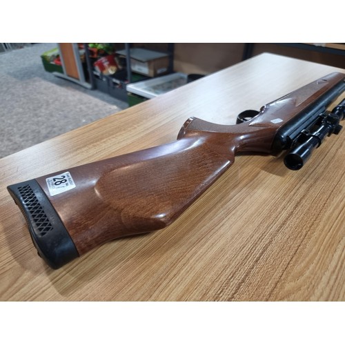 287 - A vintage good quality BSA .22 air rifle with a silencer fitted along with Nikko stirling silver cro... 