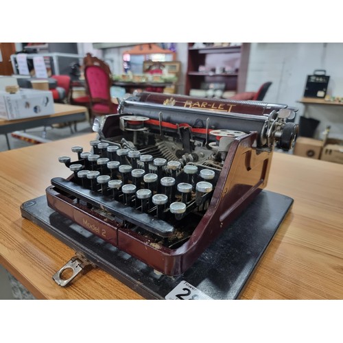 289 - A vintage 1925 bar/let mode 2 portable typewriter by John Jardine, in good vintage condition with bl... 