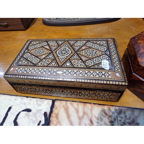 294 - 2 good wooden boxes along with 3 wooden wall plaques to include a good inlaid parquetry musical box ... 