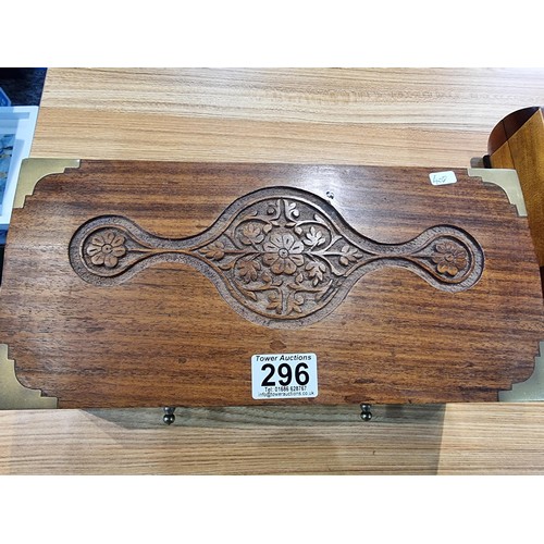 296 - 3 good wooden boxes to include a brass mounted solid mahogany storage box with a carved top with a l... 