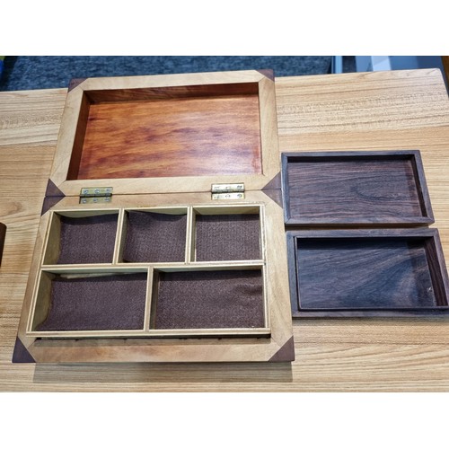 296 - 3 good wooden boxes to include a brass mounted solid mahogany storage box with a carved top with a l... 