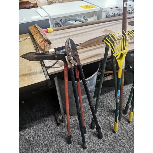 132 - Large collection of garden tools inc lawn edgers, rakes, garden brush etc