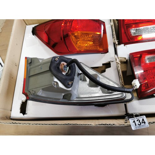 134 - A boxed set of LED tail lights for a Lexus 250, in unused condition along with instruction manual