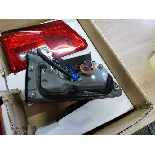 134 - A boxed set of LED tail lights for a Lexus 250, in unused condition along with instruction manual