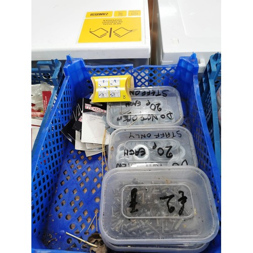 137 - 4x crates containing a large quantity of various accessories inc washers, ear plugs, nuts, bolts, pi... 