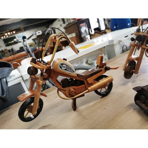 156 - Collection of 3x wooden fair trade ornamental items inc 2x motorbikes and one car, motorbikes measur... 