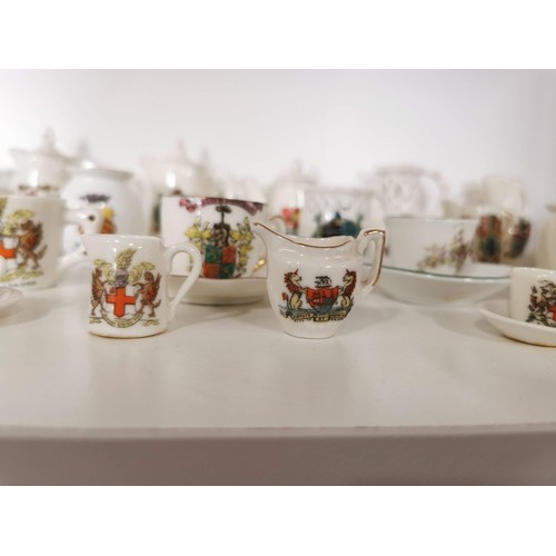 161 - Large quantity of miniature W.H. Goss inc teapots, cups and saucers, cheese domes, jugs etc from Str... 