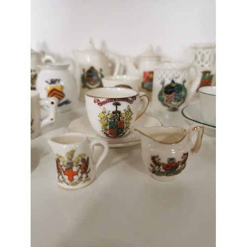 161 - Large quantity of miniature W.H. Goss inc teapots, cups and saucers, cheese domes, jugs etc from Str... 