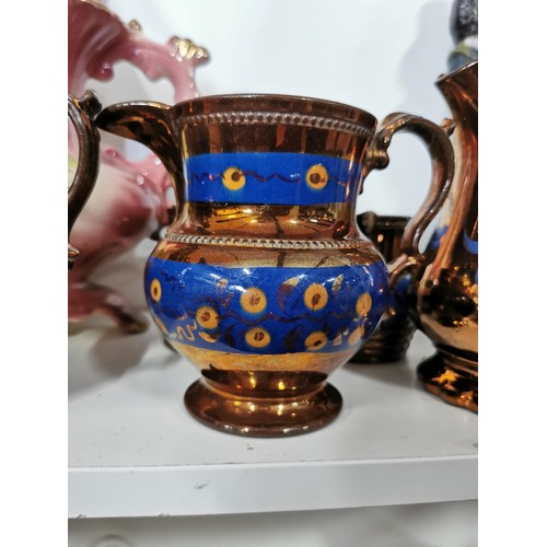 162 - Quantity of collectable china inc 6x gold luster jugs one of which is a/f along with 2x  black china... 