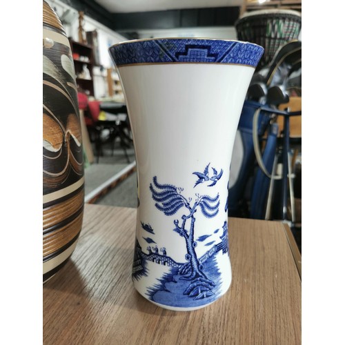 169 - A large swirl design stoneware Denby vase. along with a Royal Doulton  Real old willow pattern ceram... 