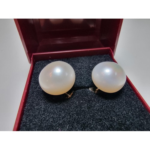 333 - A pair of large genuine pearl 925 silver stud earrings in as new condition, never had any use. diame... 