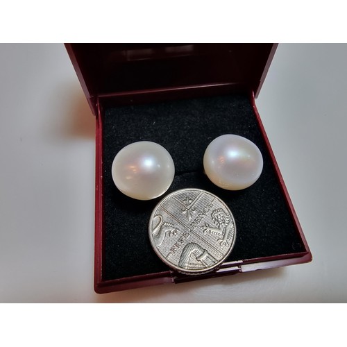 333 - A pair of large genuine pearl 925 silver stud earrings in as new condition, never had any use. diame... 