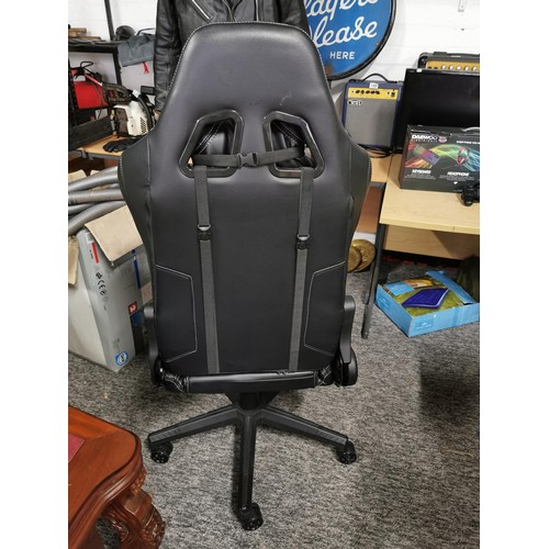 512 - A gaming chair with height and tilt adjustments in good clean condition.