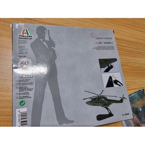 192 - Anas new boxed James Bond Skyfall model Helicopter by Italeri along with 2 Amer com model planes wit... 