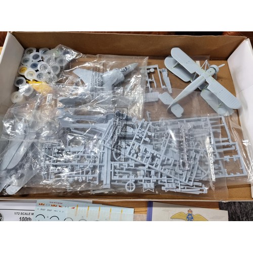 180 - 2x large airfix model plane kits both are part built but appear to be complete.