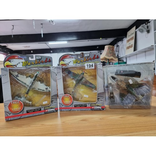 194 - 3x boxed as new diecast model planes with stands to include 2 x Corgi Warbirds series 2 planes and a... 