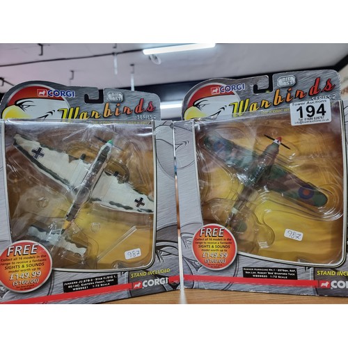 194 - 3x boxed as new diecast model planes with stands to include 2 x Corgi Warbirds series 2 planes and a... 