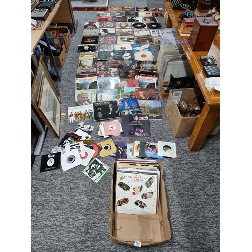 195 - A large box of LP vinyl records and 45rpm single records, to include some good bands and artists, Jo... 