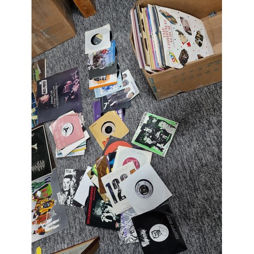 195 - A large box of LP vinyl records and 45rpm single records, to include some good bands and artists, Jo... 