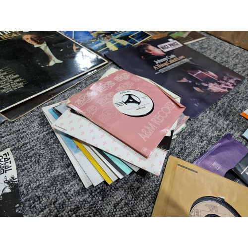 195 - A large box of LP vinyl records and 45rpm single records, to include some good bands and artists, Jo... 