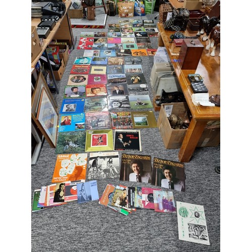 196 - A large collection of LP vinyl records and 45rpm single records, all mostly relating to local and we... 