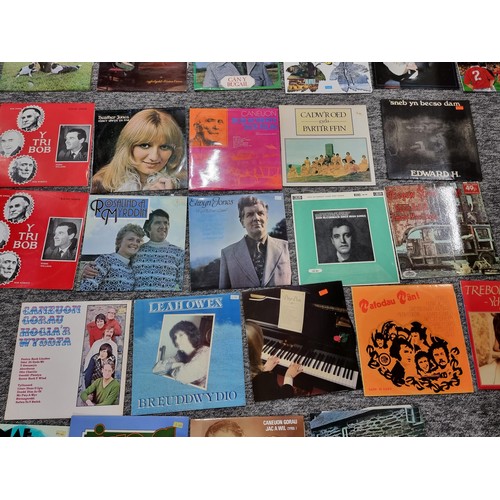 196 - A large collection of LP vinyl records and 45rpm single records, all mostly relating to local and we... 