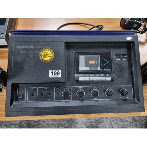 199 - A quantity of vintage electronics to include a Tandberg educational TCR922 tape player, a pair of Co... 