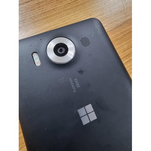 205 - A Microsoft Windows mobile phone in excellent full working condition, factory reset and ready for a ... 