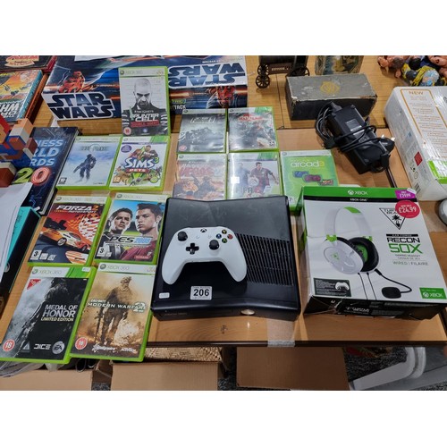 206 - A comprehensive Xbox 360 gaming console bundle to include an Xbox 360, 12 good games, a boxed turtle... 