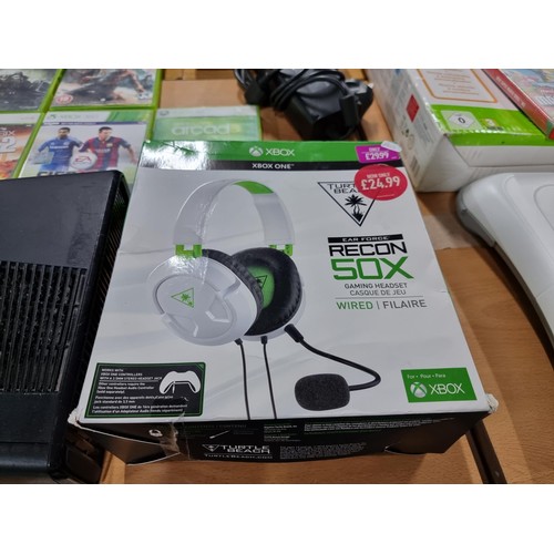 206 - A comprehensive Xbox 360 gaming console bundle to include an Xbox 360, 12 good games, a boxed turtle... 