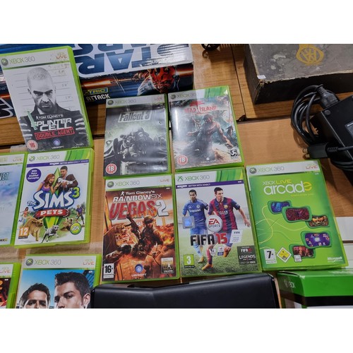 206 - A comprehensive Xbox 360 gaming console bundle to include an Xbox 360, 12 good games, a boxed turtle... 