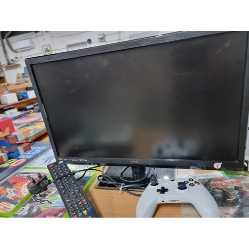 206 - A comprehensive Xbox 360 gaming console bundle to include an Xbox 360, 12 good games, a boxed turtle... 