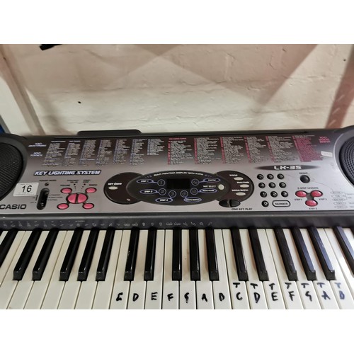 16 - Casio keyboard LX-35 with preset tunes and light up notes ideal for beginners complete with batterie... 