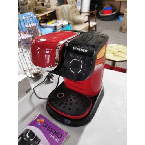 27 - Bosch red Tassimo coffee machine with new water filter complete with some drink pods and pod storage... 