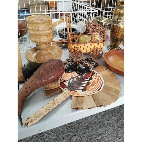 39 - 2 metal baskets containing a large quantity of collectables including wood and treen items inc marac... 