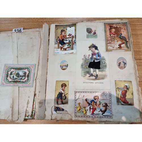 236 - A good scrap album complete to the end filled with mostly  early vintage Christmas and greeting card... 