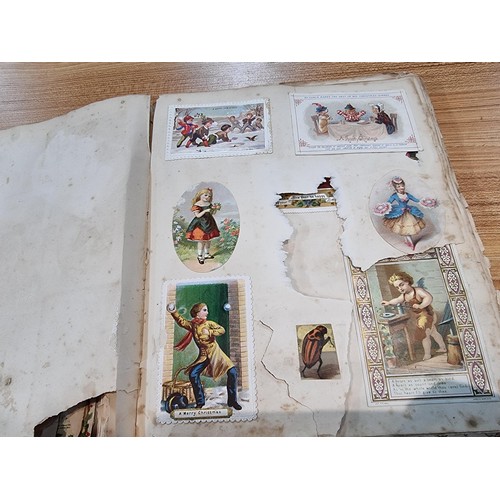 236 - A good scrap album complete to the end filled with mostly  early vintage Christmas and greeting card... 