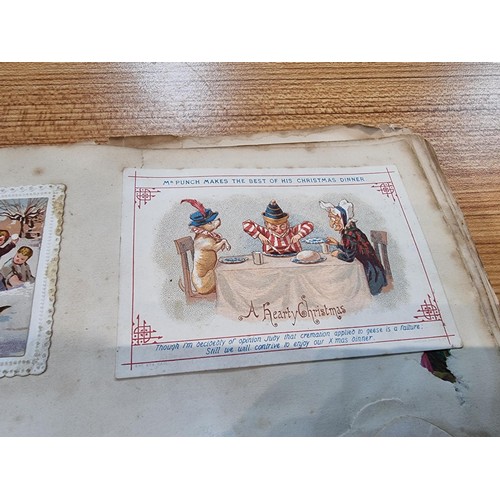 236 - A good scrap album complete to the end filled with mostly  early vintage Christmas and greeting card... 