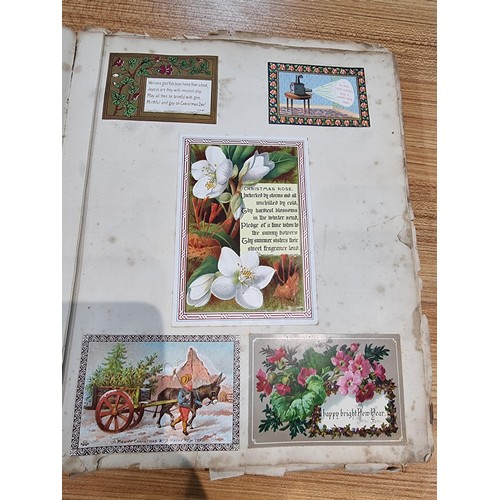 236 - A good scrap album complete to the end filled with mostly  early vintage Christmas and greeting card... 