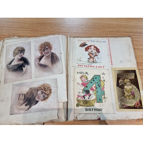 236 - A good scrap album complete to the end filled with mostly  early vintage Christmas and greeting card... 